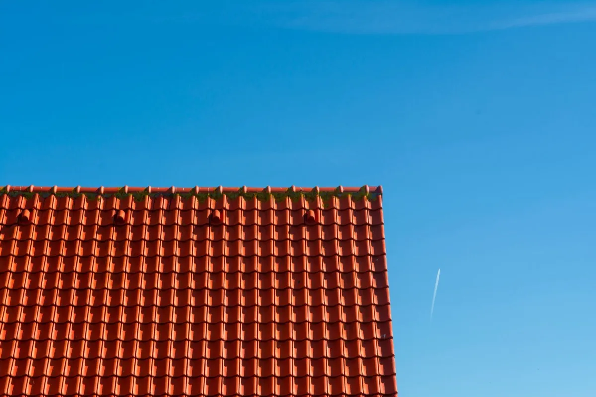 Tile roof gable in full sun, the kind of exposure that sets roof life in Columbia, MD